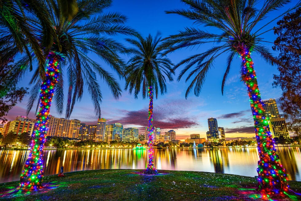 Resort Concierge Escapes Reviews shows an Orlando lakefront scene that reflects the city's parks, neighborhoods, and evening atmosphere.